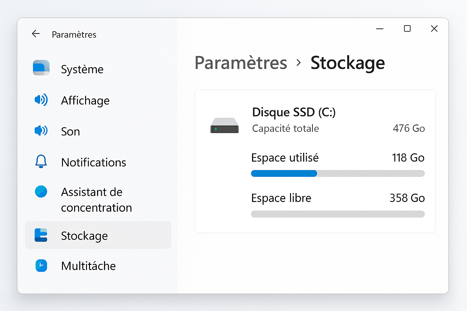 Interface Windows montrant les paramètres de stockage pour identifier un disque SSD